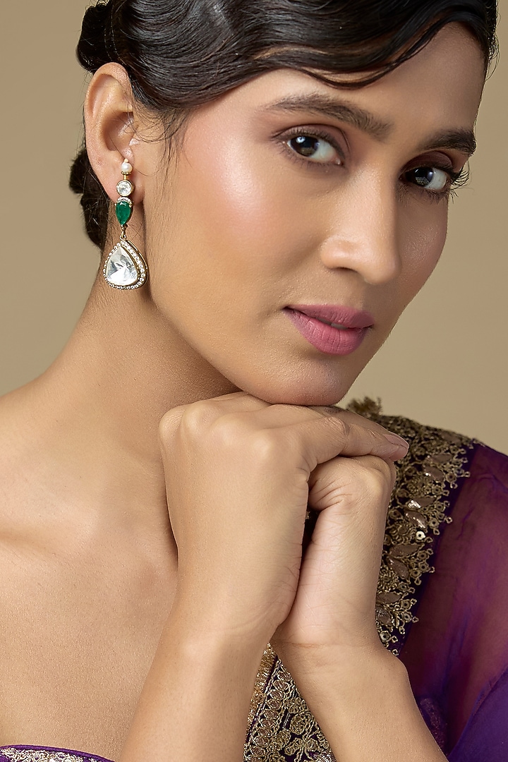 Gold Finish Kundan Polki & Emerald Stone Dangler Earrings In Sterling Silver by Kiara Luxe at Pernia's Pop Up Shop