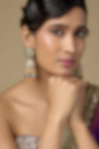 Gold Finish Kundan Polki & Emerald Gemstone Jhumka Earrings In Sterling Silver by Kiara Luxe at Pernia's Pop Up Shop