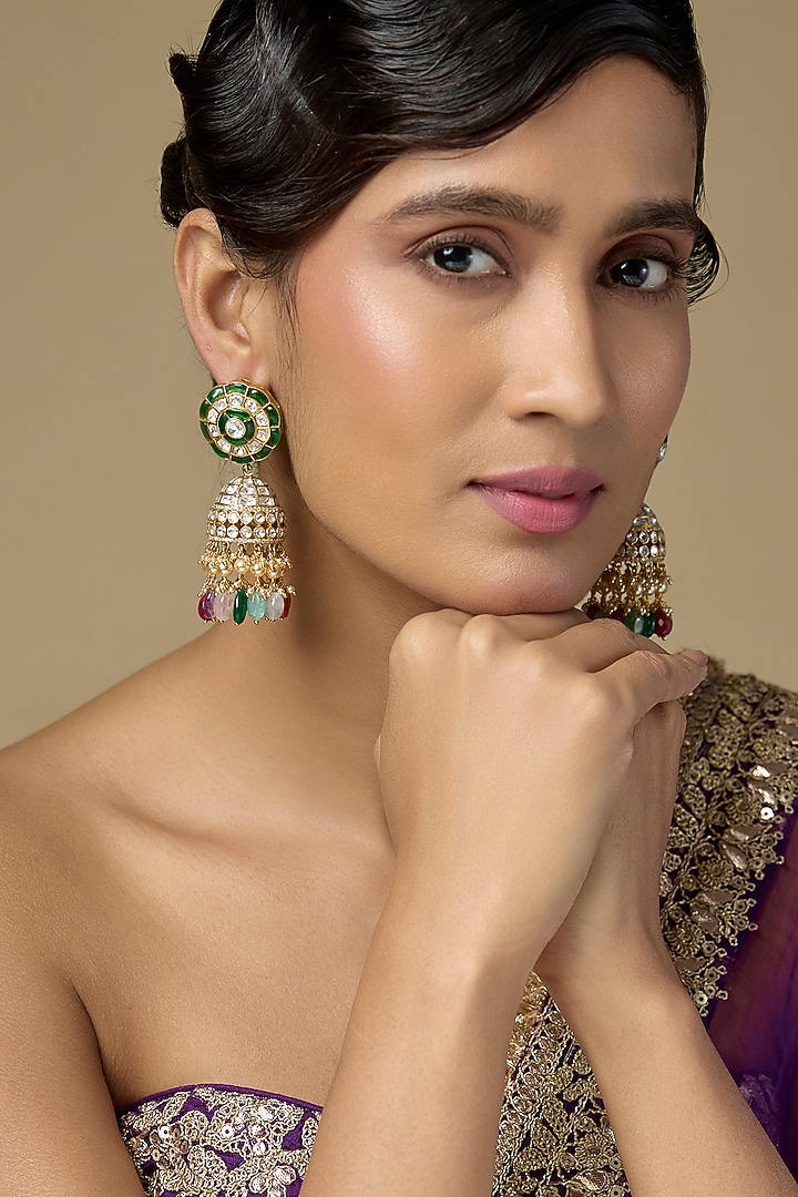 Gold Finish Kundan Polki & Emerald Gemstone Jhumka Earrings In Sterling Silver by Kiara Luxe at Pernia's Pop Up Shop