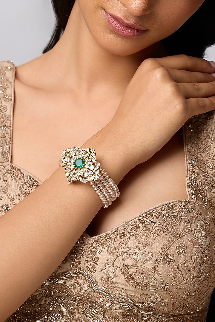 Gold Finish Kundan Polki & Emerald Bracelet In Sterling Silver by Kiara at Pernia's Pop Up Shop
