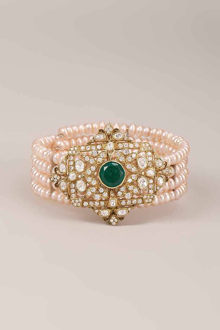 Gold Finish Kundan Polki & Emerald Bracelet In Sterling Silver by Kiara Luxe at Pernia's Pop Up Shop