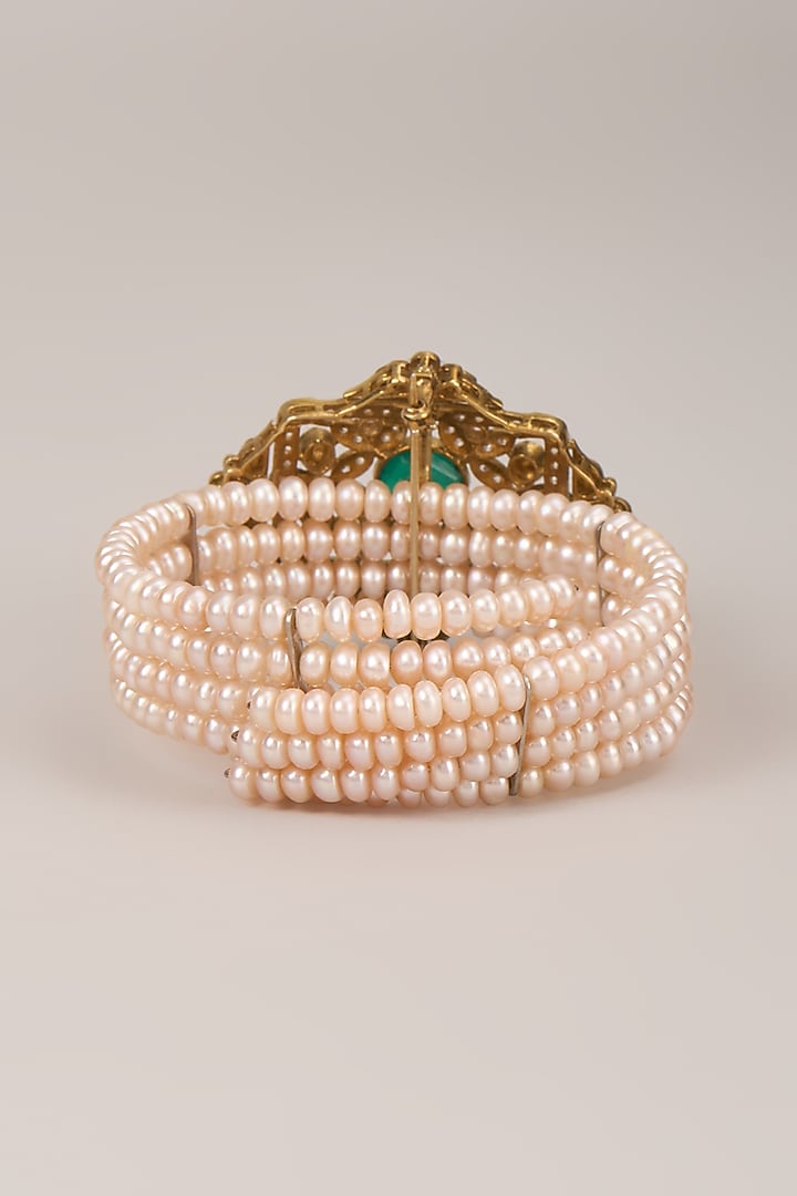 Gold Finish Kundan Polki & Emerald Bracelet In Sterling Silver by Kiara Luxe at Pernia's Pop Up Shop