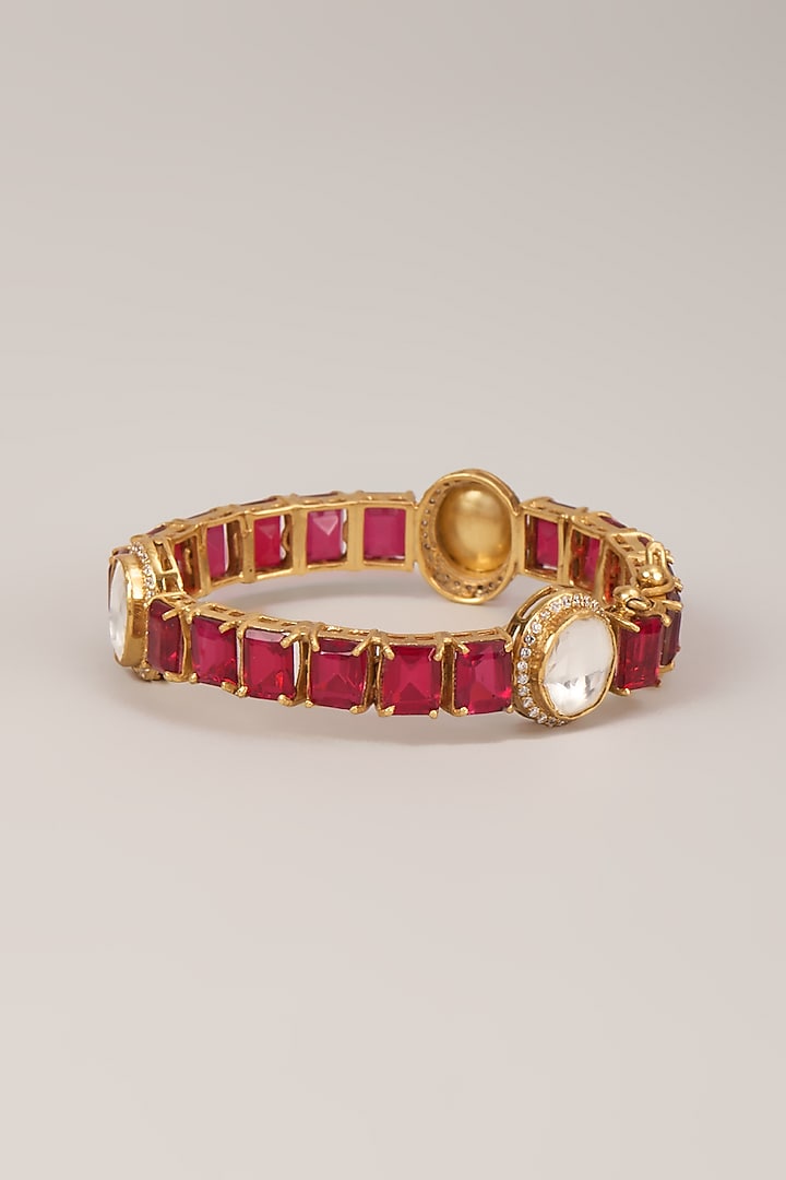 Gold Finish Polki Diamond & Ruby Stone Bangle In Sterling Silver by Kiara Luxe at Pernia's Pop Up Shop