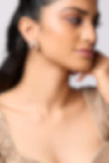 Gold Finish Kundan Polki & Ruby Stud Earrings In Sterling Silver by Kiara at Pernia's Pop Up Shop