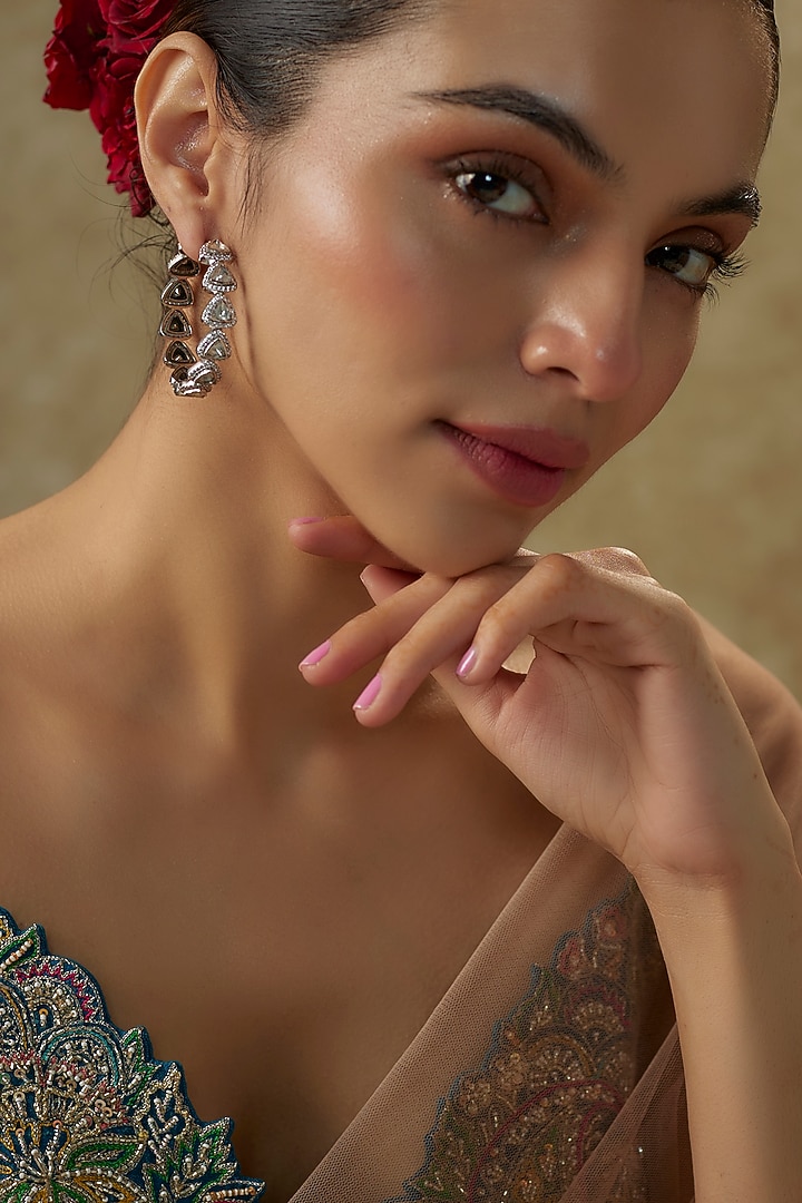 White Finish Moissanite Hoop Earrings In Sterling Silver by Kiara Luxe at Pernia's Pop Up Shop