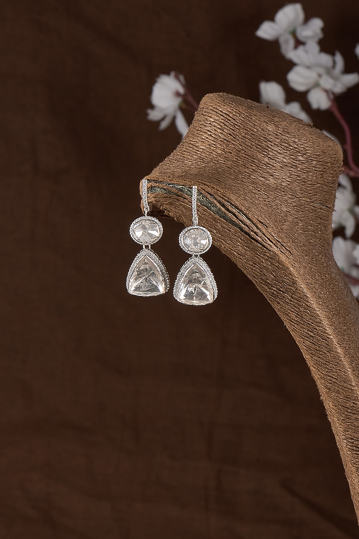 White Finish Moissanite Dangler Earrings In Sterling Silver by Kiara Luxe at Pernia's Pop Up Shop