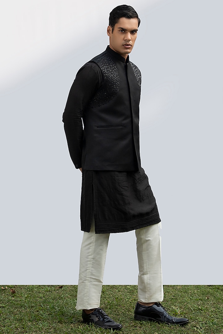 Black Suiting Fabric Hand Embroidered Bundi Jacket by KAKA CALCUTTA