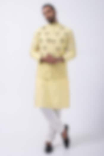 Yellow Suiting Hand Embroidered Bundi Jacket by KAKA CALCUTTA at Pernia's Pop Up Shop