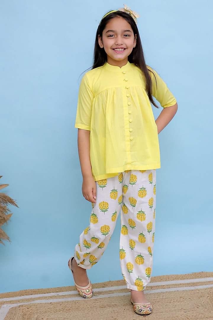 Lemon Yellow Cotton Floral Printed Kurta Set For Girls by KALP at Pernia's Pop Up Shop