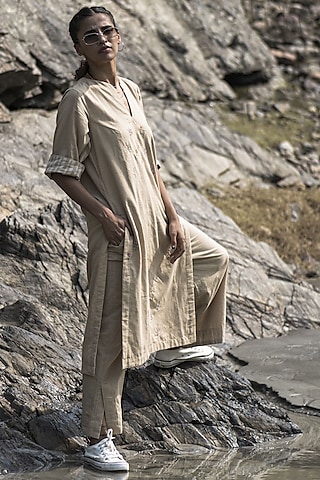 Beige Hand Embroidered Kurta by Kavana