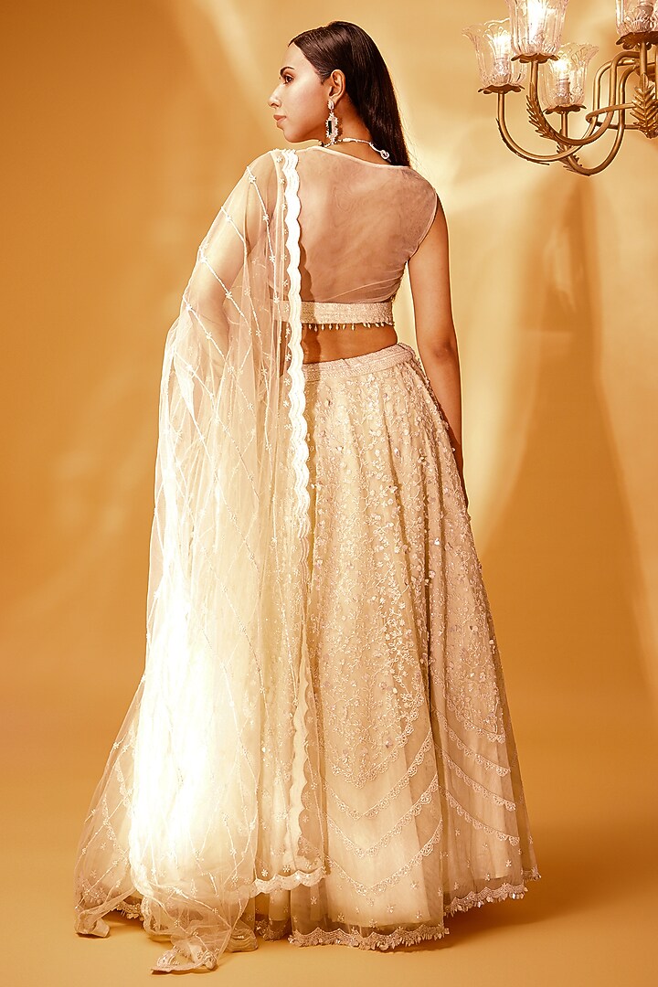 Ivory Tulle Embroidered Bridal Lehenga Set by KANJ By Priyanka Sakhuja at Pernia's Pop Up Shop