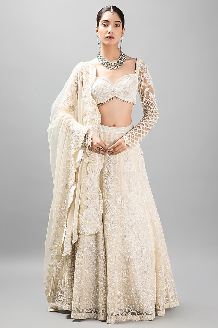 Ivory Satin Embroidered Bridal Lehenga Set by KANJ By Priyanka Sakhuja at Pernia's Pop Up Shop