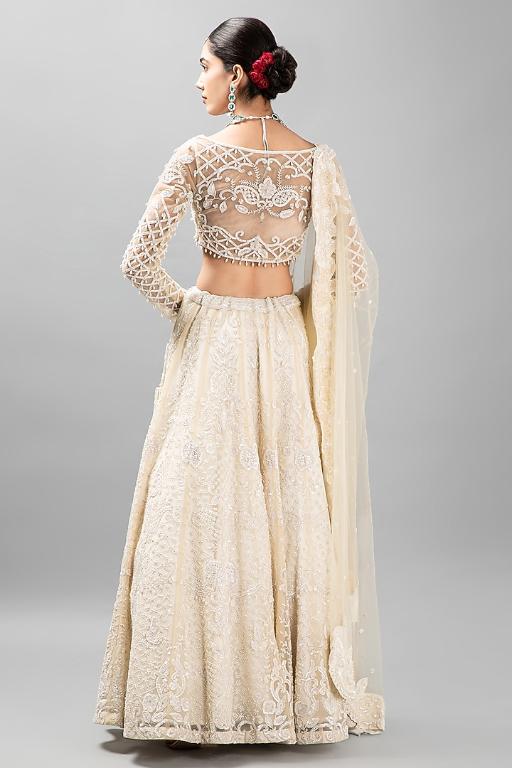 Ivory Satin Embroidered Bridal Lehenga Set by KANJ By Priyanka Sakhuja at Pernia's Pop Up Shop