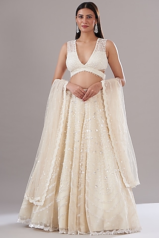 Ivory Net Embroidered Lehenga Set by KANJ By Priyanka Sakhuja