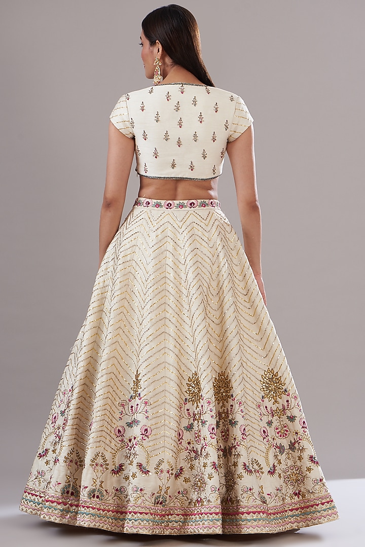 Ivory Raw Silk Hand Embroidered Wedding Lehenga Set by KANJ By Priyanka Sakhuja at Pernia's Pop Up Shop