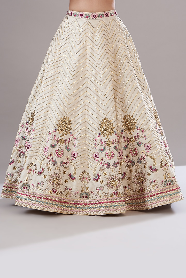 Ivory Raw Silk Hand Embroidered Wedding Lehenga Set by KANJ By Priyanka Sakhuja at Pernia's Pop Up Shop