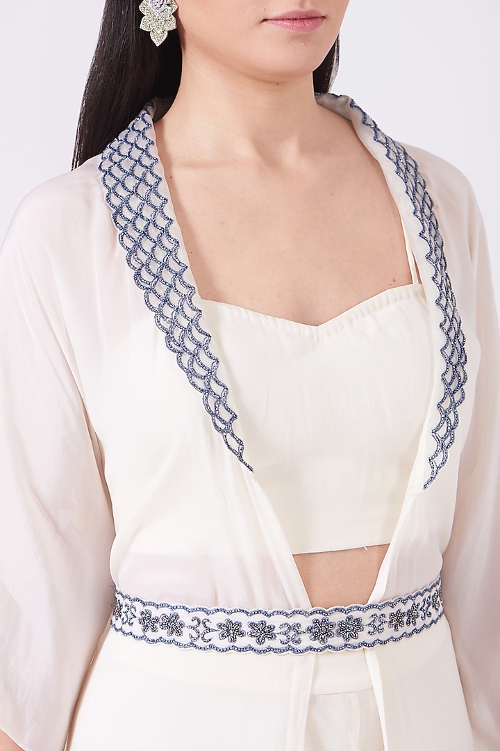 Ecru Sequins Embroidered Cape Set by KANJ By Priyanka Sakhuja at Pernia's Pop Up Shop