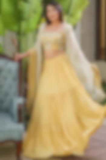 Yellow Georgette Tiered Wedding Lehenga Set by KANIKA MITTAL at Pernia's Pop Up Shop