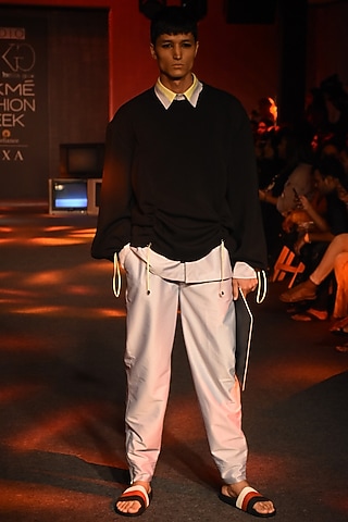 Powder Blue Pinstriped Jogger Pants by Kanika Goyal Men
