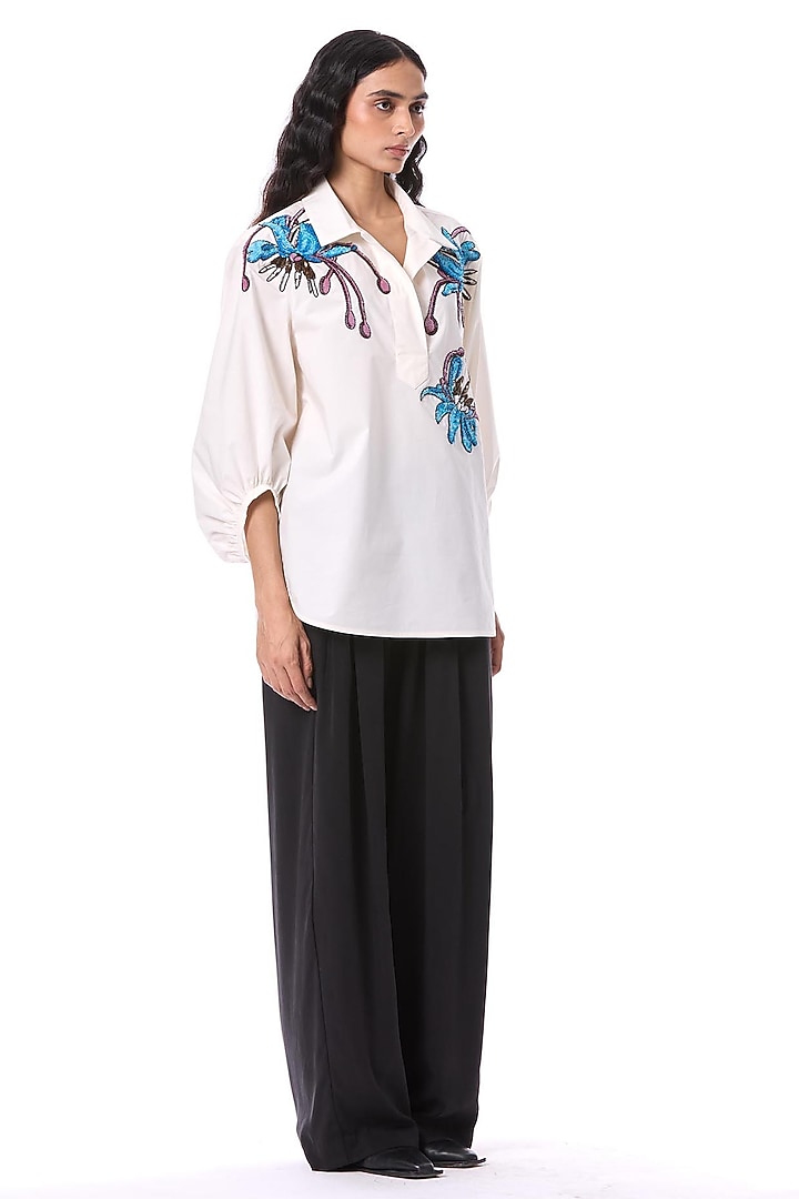 White Cotton Hand Embellished Top by Kanika Goyal at Pernia's Pop Up Shop