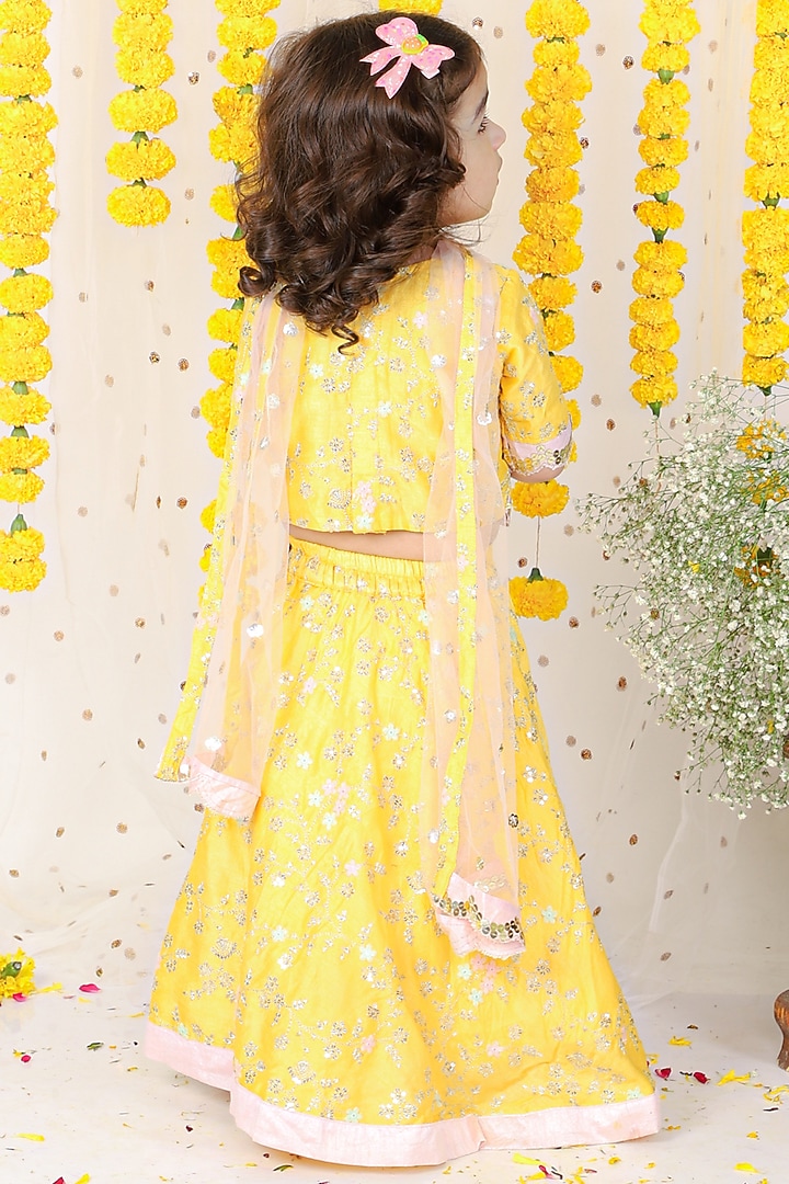 Yellow Silk & Net Embroidered Lehenga Set For Girls by Kirti Agarwal Pret n Couture at Pernia's Pop Up Shop