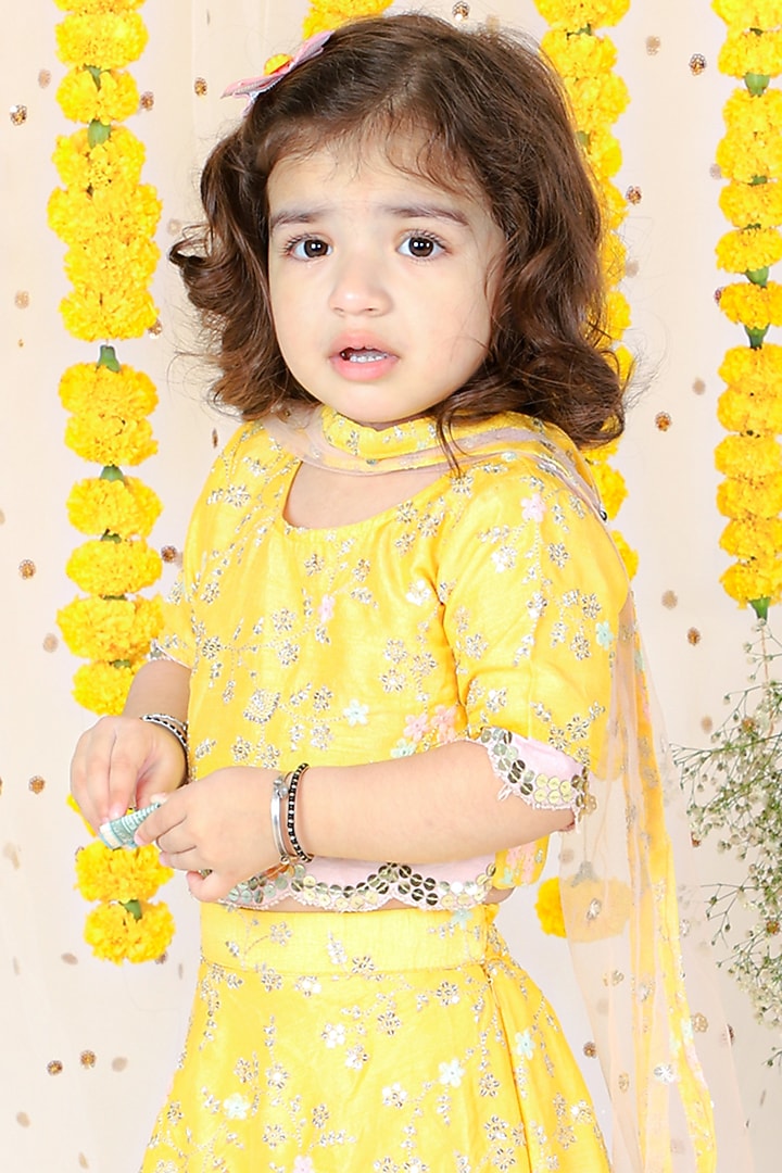 Yellow Silk & Net Embroidered Lehenga Set For Girls by Kirti Agarwal Pret n Couture at Pernia's Pop Up Shop