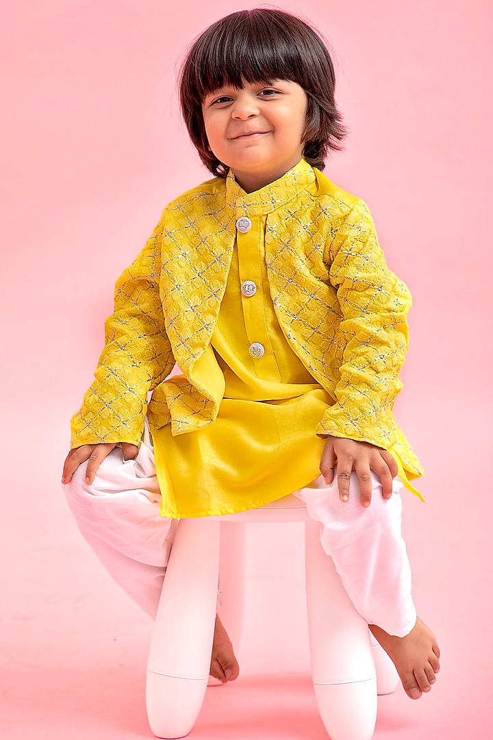 Yellow Silk & Cotton Silk Kurta Set With Attached Jacket For Boys by Kirti Agarwal Pret n Couture