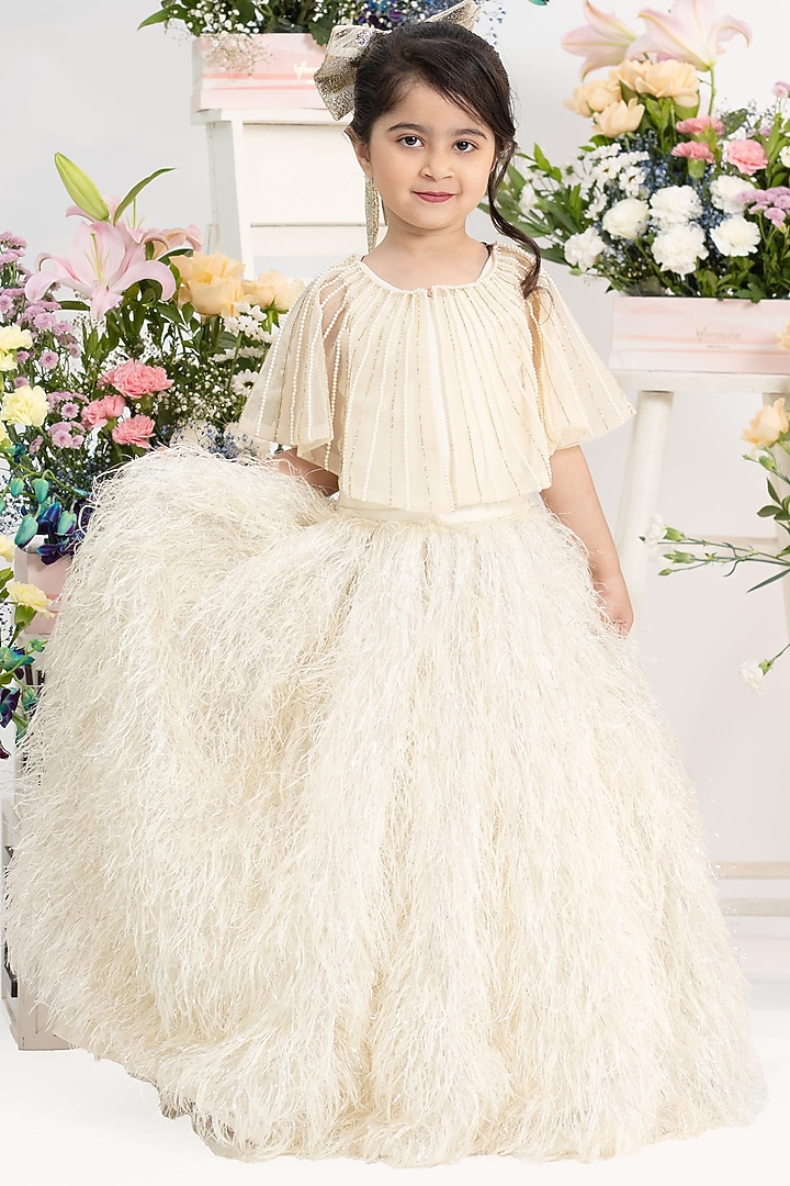 Ivory Net Pearl Hand Work Flared Lehenga Set For Girls by Kirti Agarwal Pret n Couture at Pernia's Pop Up Shop
