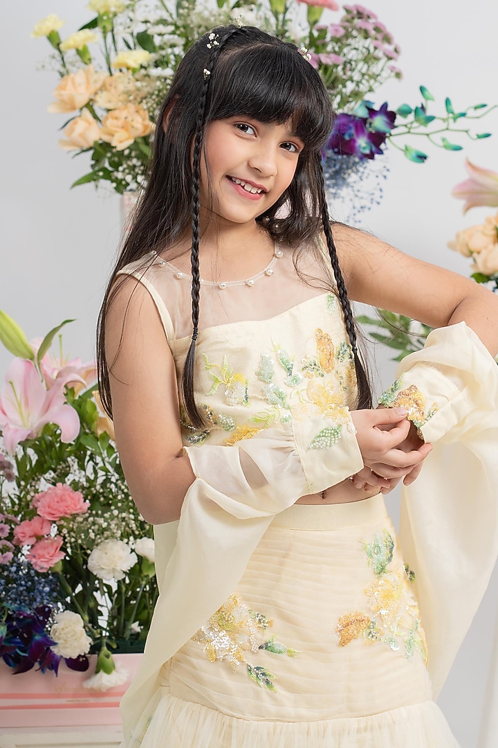 Pastel Yellow Net & Silk Floral Embroidered Lehenga Set For Girls by Kirti Agarwal Pret n Couture at Pernia's Pop Up Shop