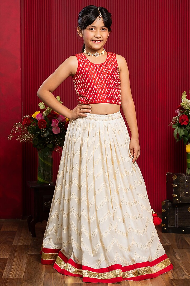 Ivory & red Pure Raw Silk Floral Embroidered Lehenga Set For Girls by Kirti Agarwal Pret n Couture at Pernia's Pop Up Shop