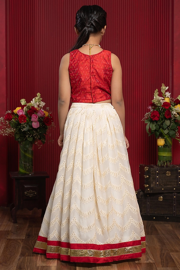 Ivory & red Pure Raw Silk Floral Embroidered Lehenga Set For Girls by Kirti Agarwal Pret n Couture at Pernia's Pop Up Shop