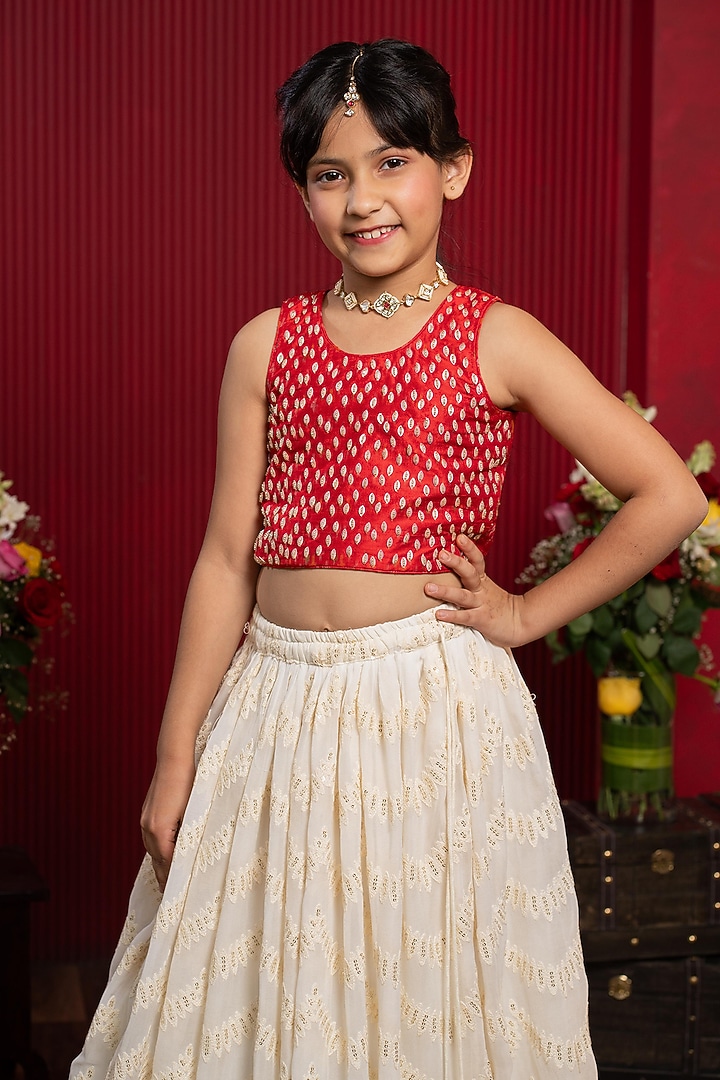 Ivory & red Pure Raw Silk Floral Embroidered Lehenga Set For Girls by Kirti Agarwal Pret n Couture at Pernia's Pop Up Shop