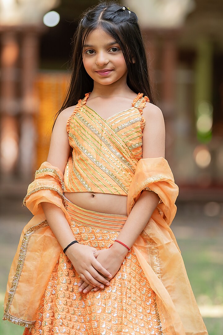 Orange Silk Embroidered Lehenga Set For Girls by Kirti Agarwal Pret n Couture at Pernia's Pop Up Shop