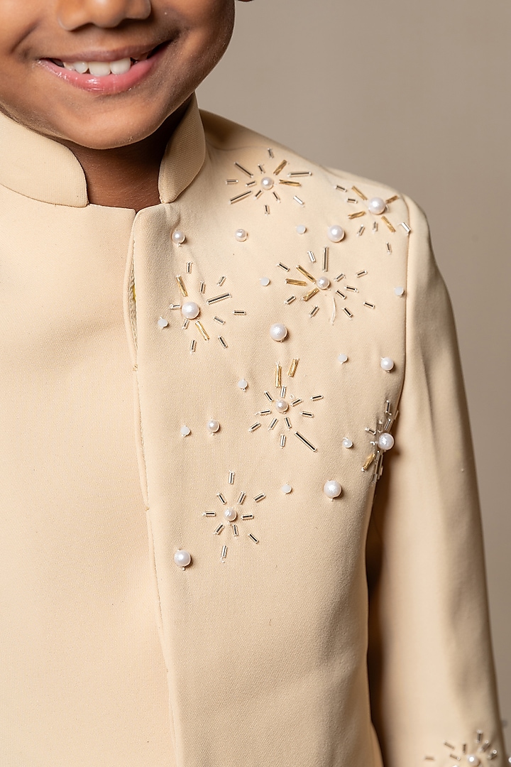 Beige Armani Fabric Embroidered Bandhgala Set For Boys by Kirti Agarwal Pret n Couture at Pernia's Pop Up Shop