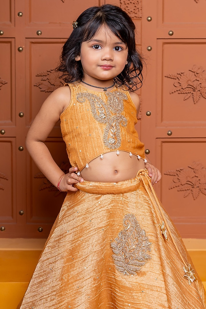 Golden Brown Tissue Silk Embroidered Lehenga Set For Girls by Kirti Agarwal Pret n Couture at Pernia's Pop Up Shop