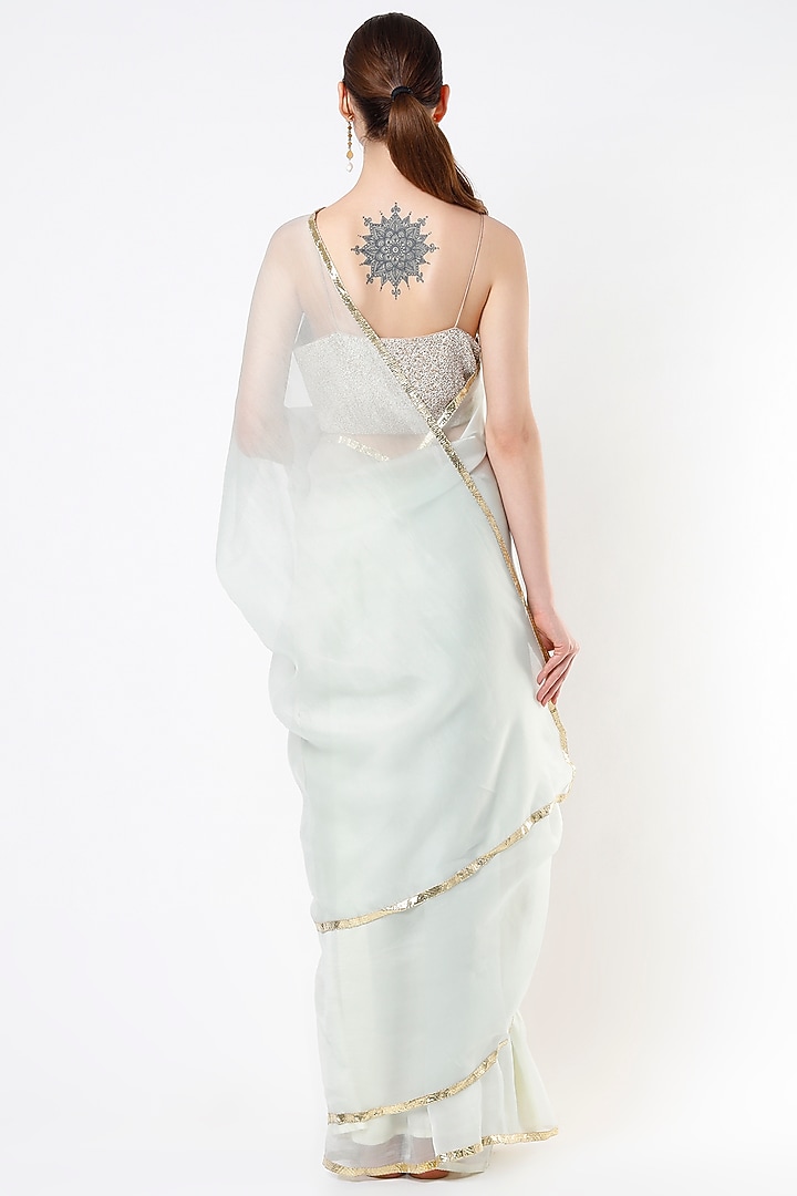 Light Teal Silk Organza Lampi Bordered Party Wear Saree by KAPARDARA at Pernia's Pop Up Shop