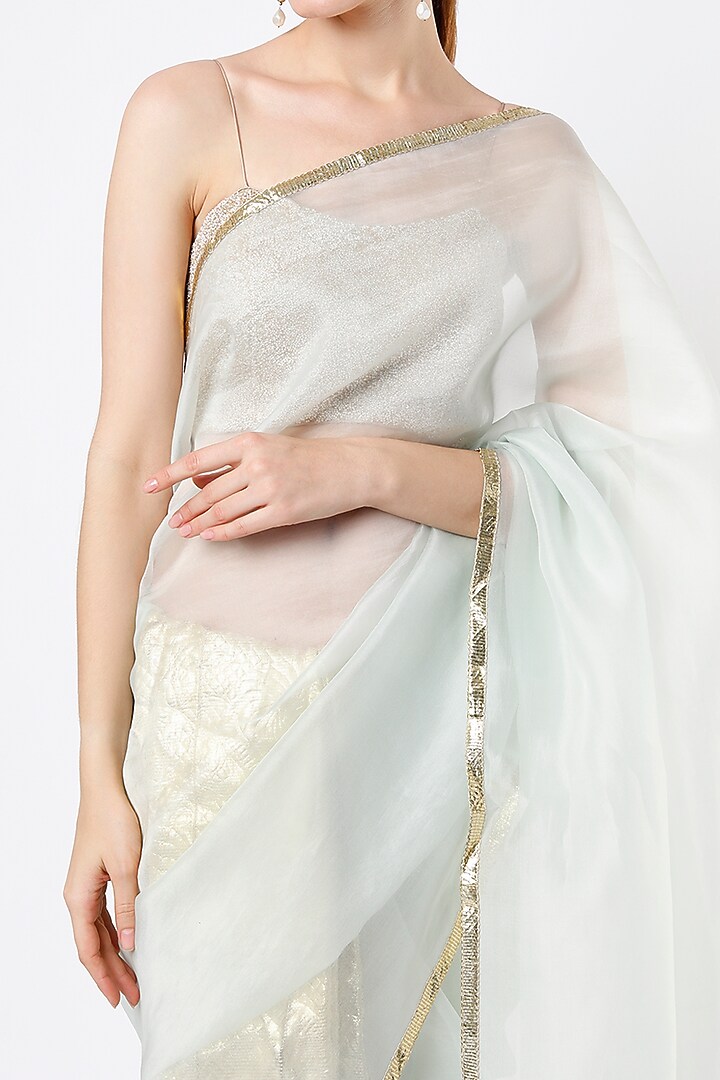 Light Teal Silk Organza Lampi Bordered Party Wear Saree by KAPARDARA at Pernia's Pop Up Shop