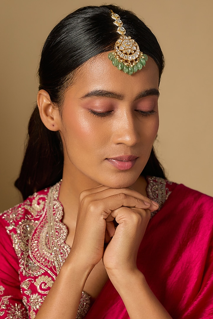 Gold Plated Moissanite Polki & Green Beaded Maangtikka In Sterling Silver by KARISA DESIGNS at Pernia's Pop Up Shop