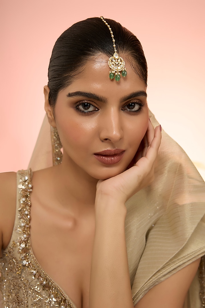 Gold Plated Green Kundan Polki Handcrafted Maangtikka In Sterling Silver In Sterling Silver by KARISA DESIGNS at Pernia's Pop Up Shop