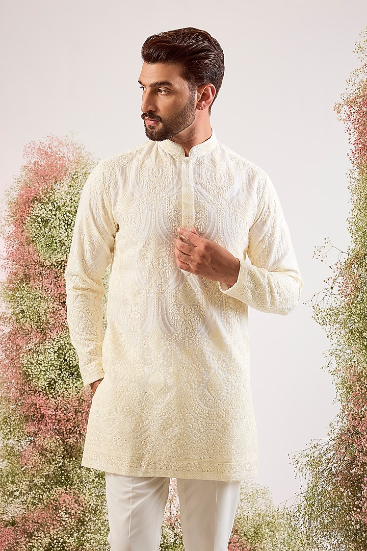 White Organza Chikankari Machine Embroidered Short Kurta by Kasbah Clothing at Pernia's Pop Up Shop