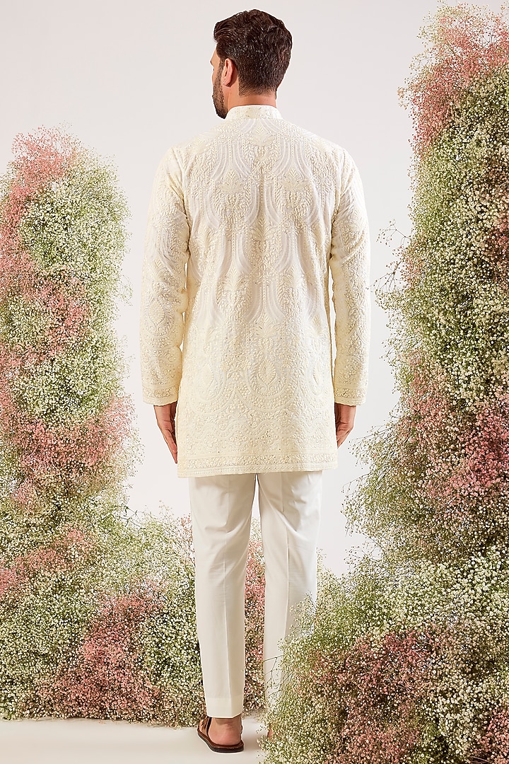 White Organza Chikankari Machine Embroidered Short Kurta by Kasbah Clothing at Pernia's Pop Up Shop