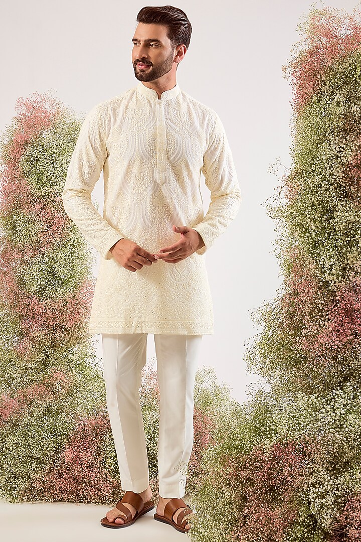 White Organza Chikankari Machine Embroidered Short Kurta by Kasbah Clothing at Pernia's Pop Up Shop