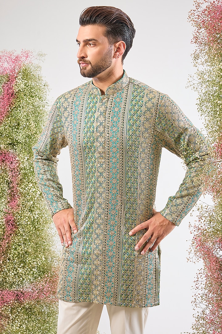 Turquoise Georgette Sequin Embroidered Short Kurta by Kasbah Clothing at Pernia's Pop Up Shop