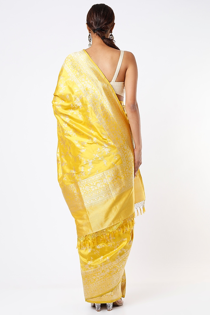 Yellow Pure Handloom Banarasi Silk Zari Embroidered Reception Saree Set
by Kasturi Kundal at Pernia's Pop Up Shop