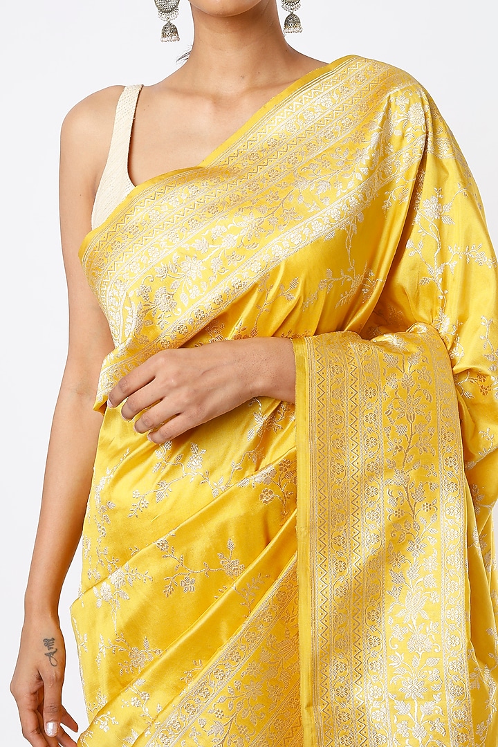 Yellow Pure Handloom Banarasi Silk Zari Embroidered Reception Saree Set
by Kasturi Kundal at Pernia's Pop Up Shop