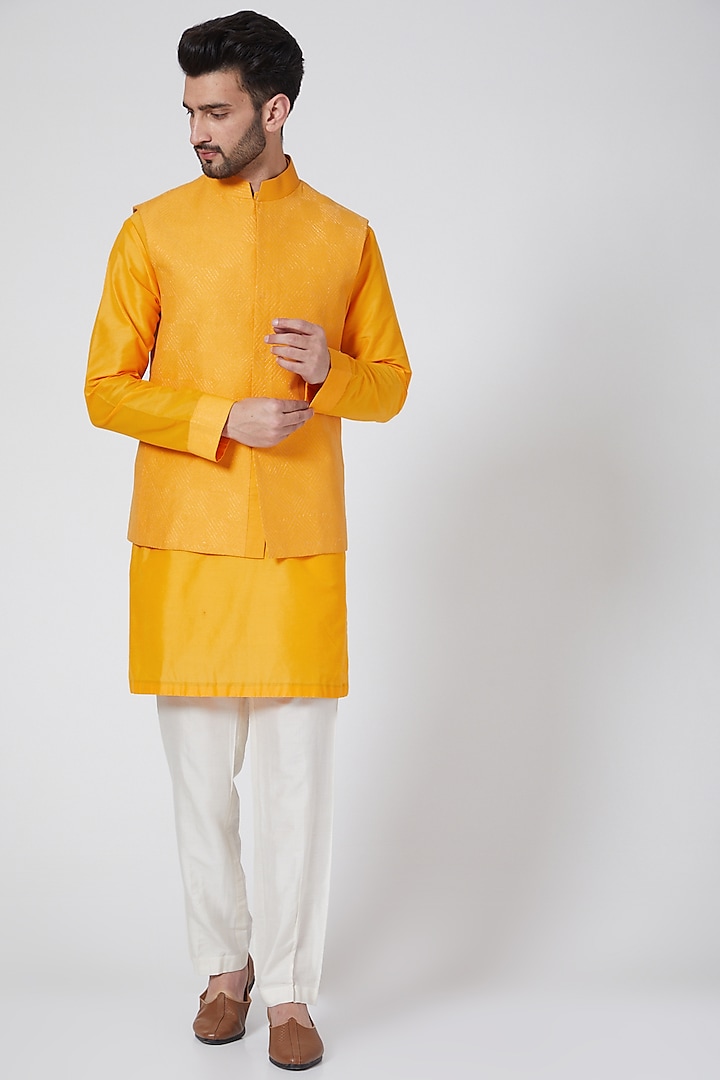Saffron Yellow Kasab Kurta Set With Bundi Jacket by Kunal Anil Tanna