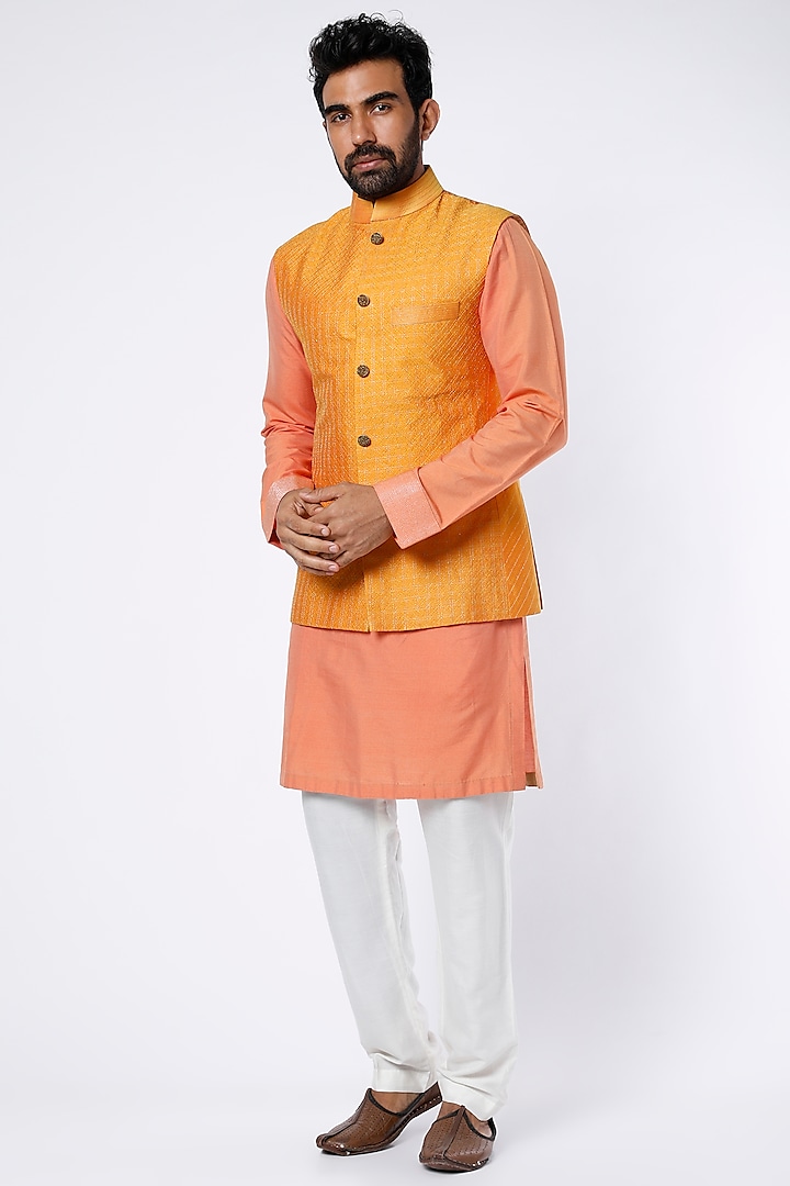 Coral Kurta Set With Orange Bundi Jacket by Kunal Anil Tanna at Pernia's Pop Up Shop