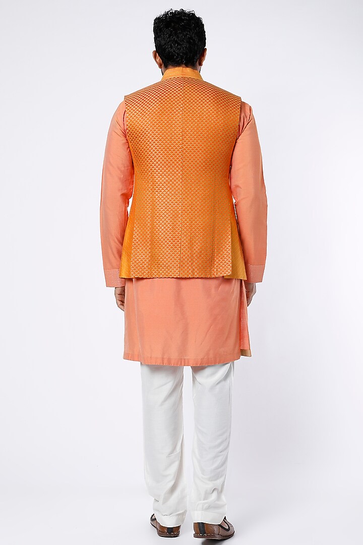 Coral Kurta Set With Orange Bundi Jacket by Kunal Anil Tanna at Pernia's Pop Up Shop