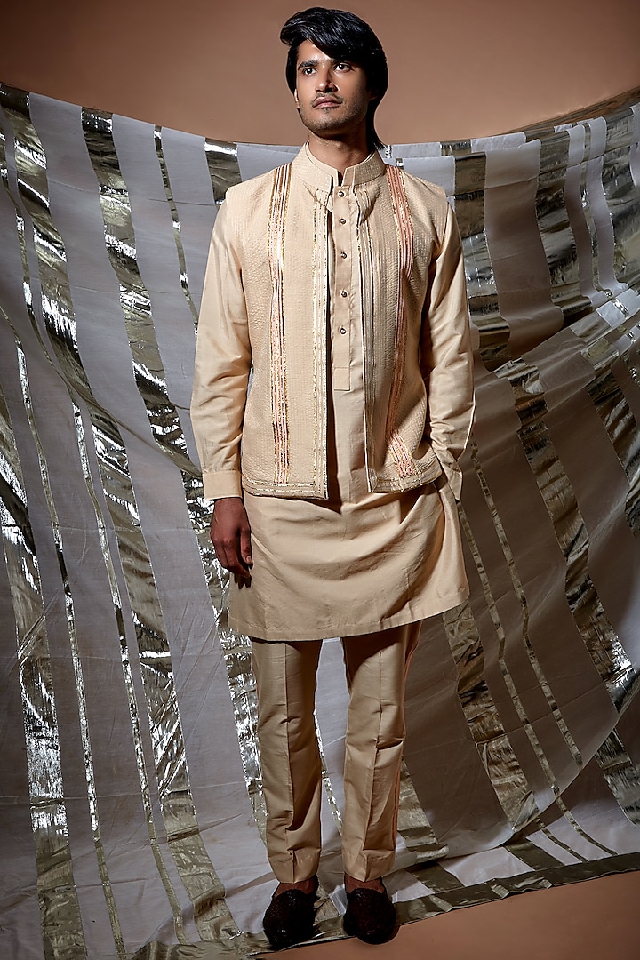 Beige Silk Bundi Jacket With Kurta Set by Kunal Anil Tanna