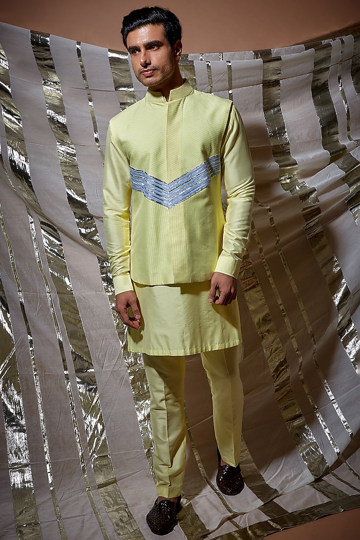 Yellow Silk Bundi Jacket With Kurta Set by Kunal Anil Tanna